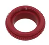 A red plastic fitting with text on it, isolated on a white background. Produktbild-Vorschau