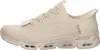 A side view of a beige Skechers slip-on sneaker. Produktbild-Vorschau