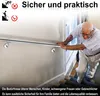 An elderly man is using a handrail on stairs. Náhled obrázku produktu