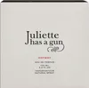 The image shows the front of a perfume box. Voir les images du produit