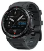 A close-up, angled view of a smartwatch with a dark gray band and a black face displaying various metrics and the time. Produktbild-Vorschau