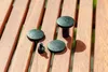Four black fountain nozzles of different sizes are arranged on a wooden surface. Náhľad obrázku produktu
