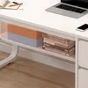 A close-up view of a white computer desk with storage shelves. Podgląd zdjęcia produktu