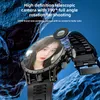 A smartwatch with a camera lens extended, showing a selfie of a woman on its screen, set against a dark, textured background. Podgląd zdjęcia produktu