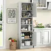 A tall, white storage cabinet with multiple shelves and doors, filled with kitchenware and pantry items. A William Morris poster is on the wall to the left. Podgląd zdjęcia produktu