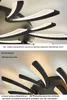 Close-up shots of a modern LED ceiling light with curved black and white elements. Produktbild-Vorschau
