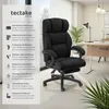 A black office chair is shown in a modern office setting with a desk and plants in the background. A panel on the left lists the chair's features. Náhled obrázku produktu