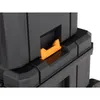 A close-up view of a black tool storage unit with an orange latch mechanism. Podgląd zdjęcia produktu