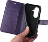 A hand is holding a purple flip phone case, showing the inside of the case where a phone would be placed. Produktbild-Vorschau
