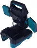 A black and teal work lamp with adjustable light panels is shown from a diagonal angle against a white background. Produktbild-Vorschau