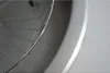 A close-up view of a stainless steel sink with a curved edge. Produktbild-Vorschau