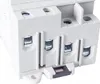 A close-up view of the electrical terminals of a white DC main switch. Náhľad obrázku produktu