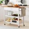 A white kitchen cart filled with kitchenware and produce, placed in a kitchen setting. Náhled obrázku produktu