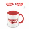 A white mug with a red interior and handle, featuring the Stranger Things logo in red. Anteprima dell’immagine prodotto