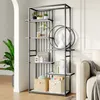 A modern industrial-style bookshelf filled with decorative items and books, placed in a living room setting next to a sofa. Podgląd zdjęcia produktu