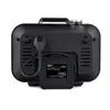 The rear view of a black electrical appliance, likely a waffle maker, showing its power cord and plug. A small black label with product information and certifications is attached to the cord. Produktbild-Vorschau