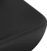 A close-up view of the corner of a black rectangular washbasin. Produktbild-Vorschau