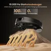 A robot vacuum cleaner is shown cleaning up a pile of sand, demonstrating its suction power. Produktbild-Vorschau