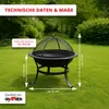 A black metal fire pit with a mesh lid sits on a green lawn, with trees and bushes in the background. Text overlays provide technical specifications and brand information. Produktbild-Vorschau