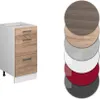 A kitchen cabinet with drawers next to a stack of circular color samples. Produktbild-Vorschau