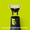 A close-up of a Philips OneBlade shaver head and handle, shown separately against a bright green background. Anteprima dell’immagine prodotto