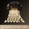 A robot vacuum cleaner is shown from underneath, with sand being sucked up and forming the text '30000 Pa'. Produktbild-Vorschau