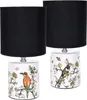 Two table lamps with black shades and ceramic bases decorated with birds and butterflies. Produktbild-Vorschau