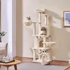 Three cats are playing on a tall, multi-level cat tree in a living room setting. Podgląd zdjęcia produktu