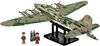 A model airplane on a display stand with two small figures and bombs. Voir les images du produit