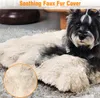 A dog lying on a soft, plush dog bed. Anteprima dell’immagine prodotto