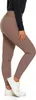 A person wearing leggings and sneakers, shown from the side. Produktbild-Vorschau