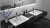 A modern bathroom vanity with two sinks and faucets, illuminated by LED lighting. Náhľad obrázku produktu