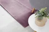 Weicher Hochflor-Teppich in der Farbe Lavendel ausgelegt im Wohnzimmer.
 Produktbild-Vorschau