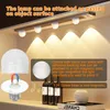 Under-cabinet lighting with multiple bulbs illuminating a countertop with wine bottles and a book. Produktbild-Vorschau