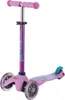 A three-wheeled scooter for children, shown against a white background. Voir les images du produit