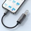 A close-up shot of a USB-C OTG adapter connected to a smartphone, showing its functionality. Náhľad obrázku produktu