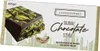 A chocolate bar with a cutaway showing the filling, set against a background of stylized city buildings. Produktbild-Vorschau