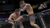 Two MMA fighters in a ring during a match. Náhled obrázku produktu