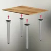 An illustration showing how to attach table legs to a tabletop. Voir les images du produit