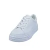 A white sneaker with a platform sole is shown against a white background. Produktbild-Vorschau