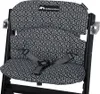 A close-up view of a black high chair seat cushion with a geometric pattern. Produktbild-Vorschau