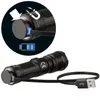 A close-up view of a black LED flashlight with a USB charging cable attached, and a circular inset showing a magnetic charging connection and battery indicator. Produktbild-Vorschau