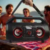 People enjoying an outdoor gathering with a portable speaker. Produktbild-Vorschau