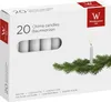 A box of white chime candles with a sprig of pine needles and a lit candle. Náhľad obrázku produktu