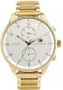 A close-up studio shot of a gold Tommy Hilfiger watch with a white face. Produktbild-Vorschau