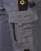 Close-up of a grey work pant with multiple pockets and orange stitching. Produktbild-Vorschau