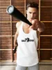 A man in a gym wearing a white tank top with a logo, holding a black baseball bat. Produktbild-Vorschau