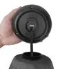 A hand holding the top part of a dark gray umbrella, showing the connection point for the pole and wires. Produktbild-Vorschau