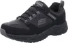 A single black and gray Skechers shoe is shown from a side-angle on a white background. Anteprima dell’immagine prodotto