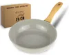 A frying pan and its packaging are displayed against a white background. Produktbild-Vorschau